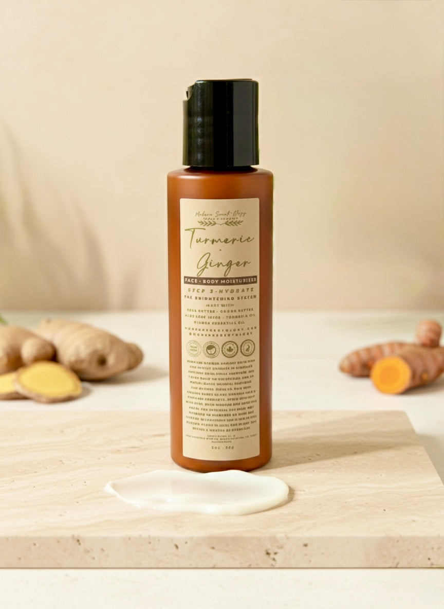 Turmeric & Ginger Radiance Renewal Set:  Includes a handcrafted hydrating lotion, infused with turmeric, ginger, and sweet orange essential oils arranged on a neutral background.