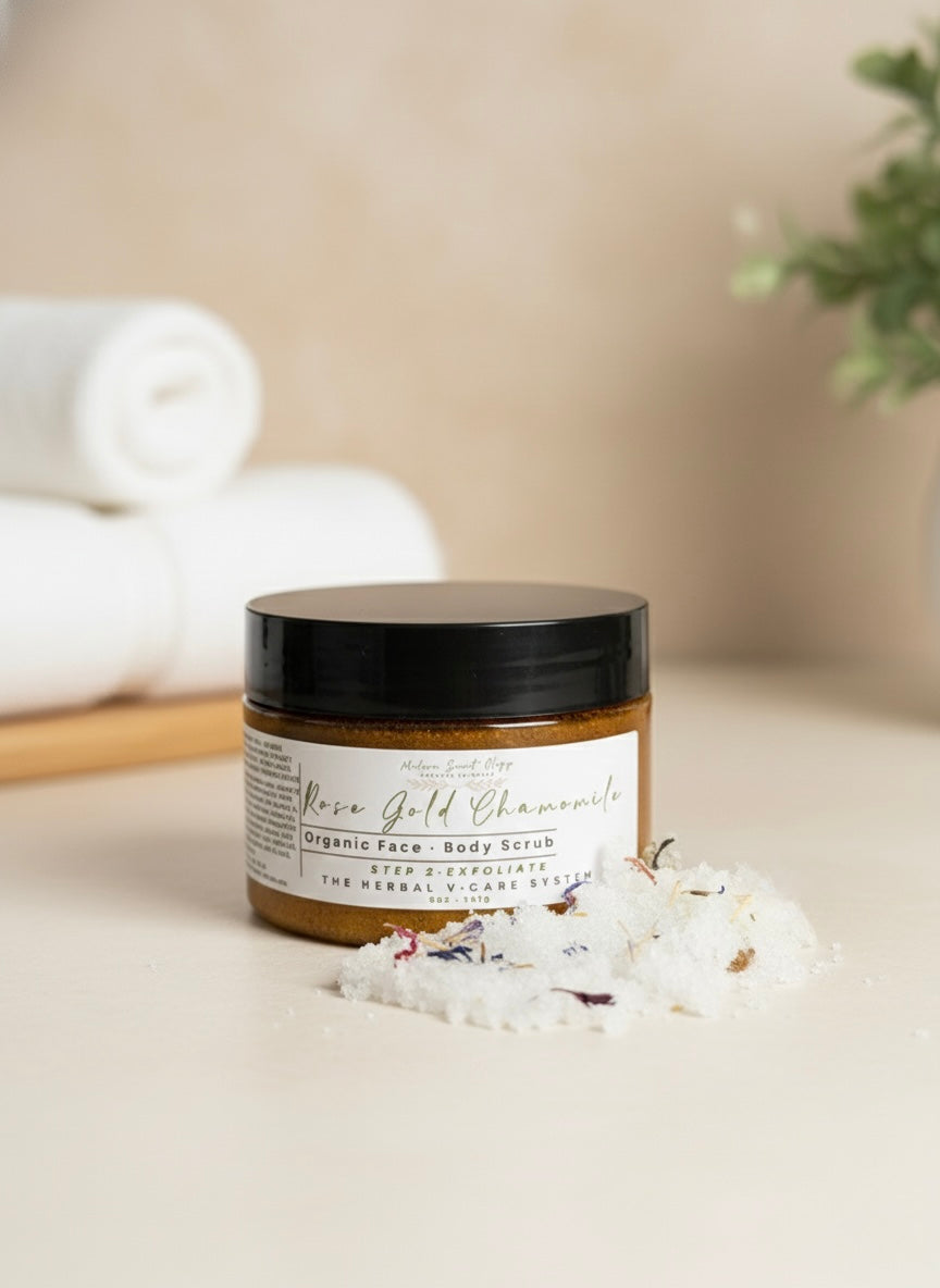 Modern Scentology Vcare System Scrub displayed on a neutral background, featuring an all-natural feminine care set with coordinating bottles and jars designed for gentle daily cleansing, soothing hydration, and intimate skin wellness.