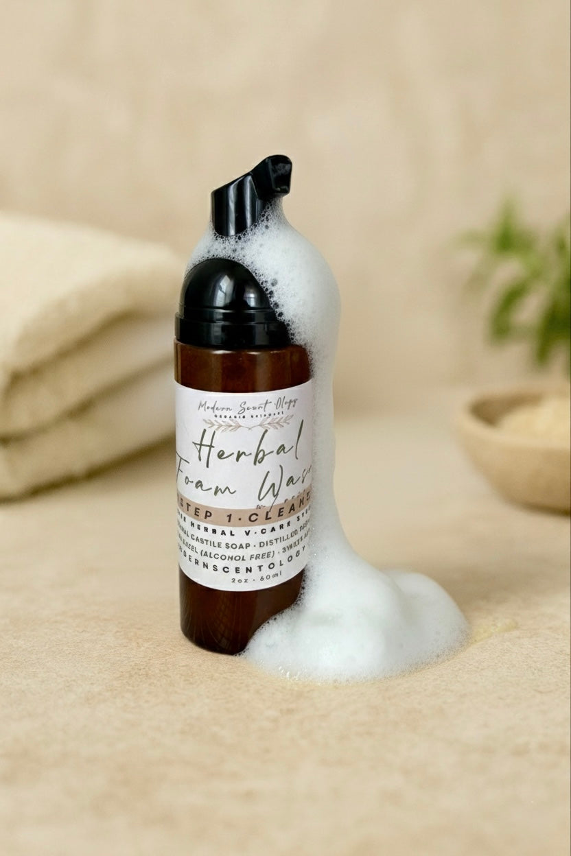 Modern Scentology Vcare System foam wash displayed on a neutral background, featuring an all-natural feminine care set with coordinating bottles and jars designed for gentle daily cleansing, soothing hydration, and intimate skin wellness.